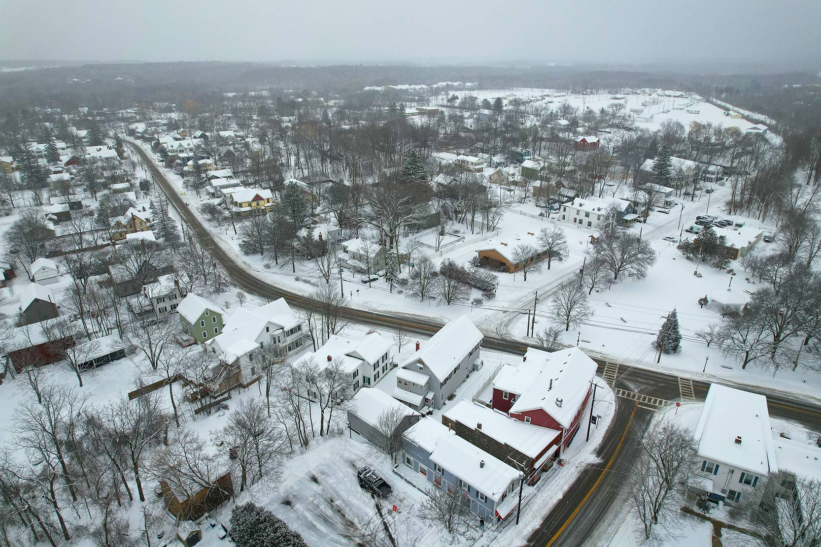 Aerial view of the Village of Altamont blanketed in snow
